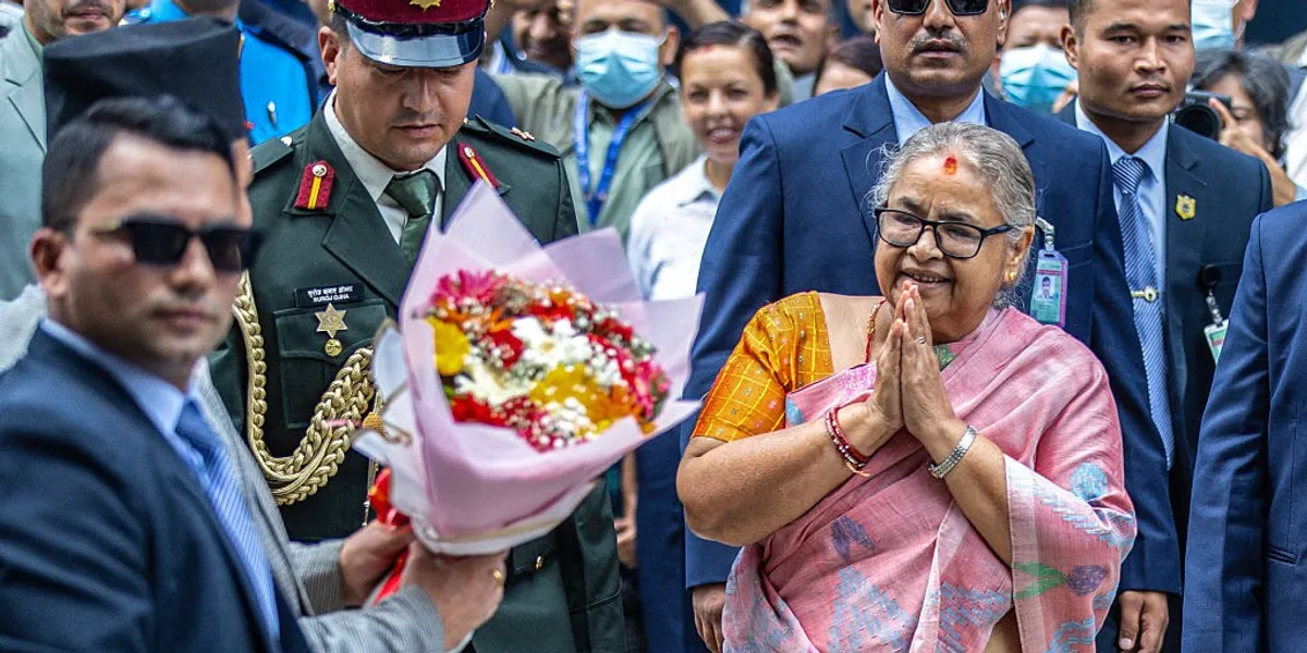 officials-greet-newly-elected-prime-minister-of-nepal-s-interim-government-sushila-karki-r-as-she-arrives-at-the-prime-ministe.webp